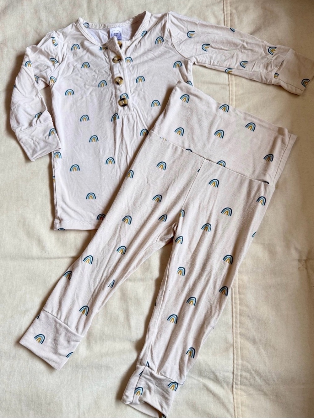 Lou Lou & Co. Baby Top + Bottom Pajama Set In Ezra rainbow 6/12M
